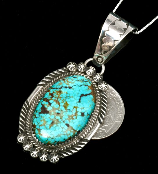 Medium-size turquoise pendant with chain by Navajo artisan Phillip Yazzie #1873