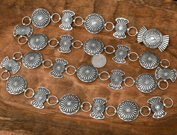 Somewhat thicker-gauge, Sterling silver, dead-pawn link concho belt with TWENTY-FOUR conchos, by Dene Tsosie Bini. SOLD! #2066