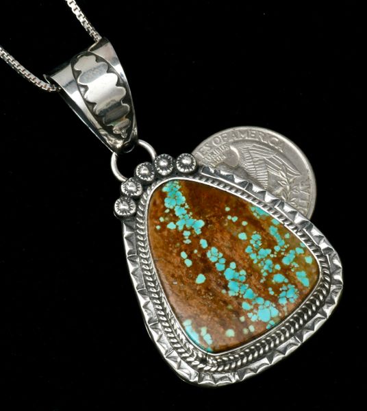 Medium-size Phillip Yazzie Navajo pendant (with chain) with No. 8 Mine turquoise. #2071