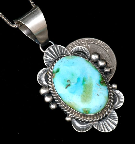 Intricately stamped Mary Ann Spencer Navajo old-style turquoise pendant with chain. #2077