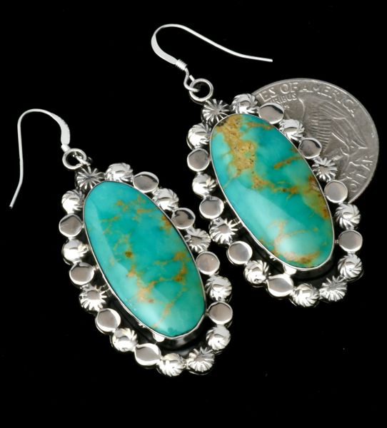 Bright finish turquoise earrings by Navajo artisan Sheena Jack. #2096
