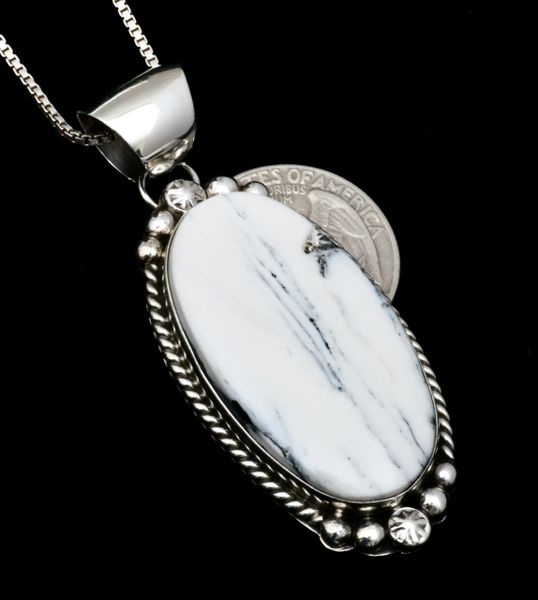 Sleek White Buffalo Navajo pendant w/Sterling chain, by Augustine Largo.