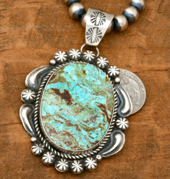 No. 8 Mine turquoise old-style patina Navajo pendant with reverse-stamped repousse' by Jeff James (bead chain optional). #2336
