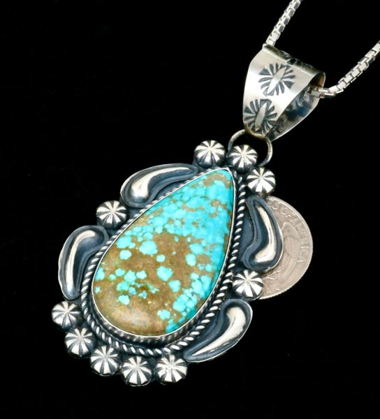 Navajo reverse-stamped repousse'pendant (and chain) with No. 8 Mine turquoise. #2367