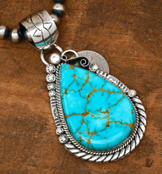 Large teardrop-shaped Kingman turquoise Navajo pendant. by Augustine Largo. SOLD #2320a