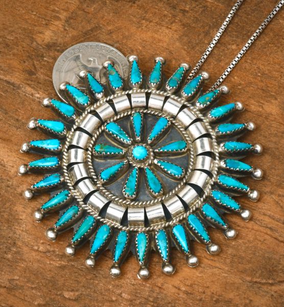 Large, slightly older 39-stone cluster pendant with deep-set natural Kingman turquoise by Navajo artisan Tommy Lowe. #2386a