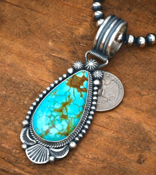 Finely crafted Michael Calladitto' Navajo large-bale pendant in old-style patina. #2371