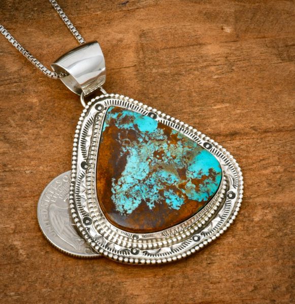 Larger, finely-crafted turquoise pendant by Navajo artisan Augustine Largo. #2401a