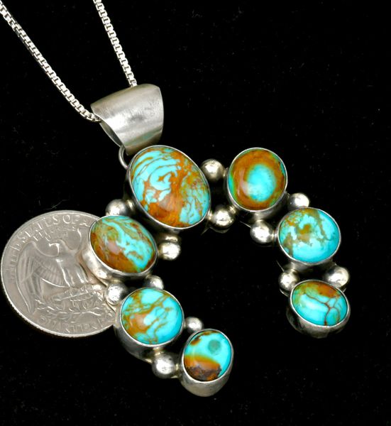 Colorful Kingman turquoise Navajo Naja (w/chain), by Augustine Largo. #2429a