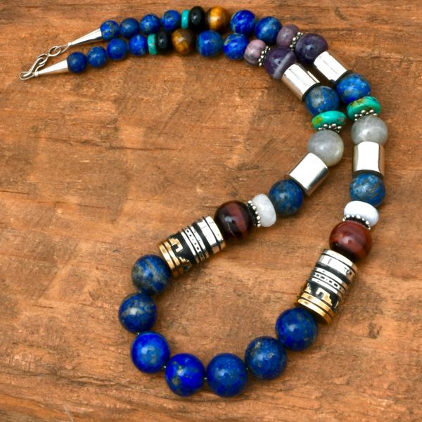 T&R Singer gold and silver barrel bead and Lapis 21.75-inch necklace. #2443a