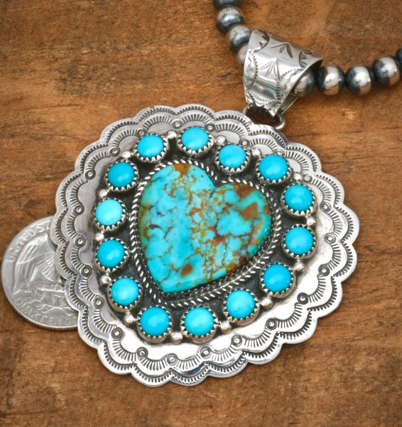 Exquisitely hand-stamped turquoise heart shaped pendant by Navajo artisan Gina Jones (bead chain optional at additional cost). SOLD! #2524