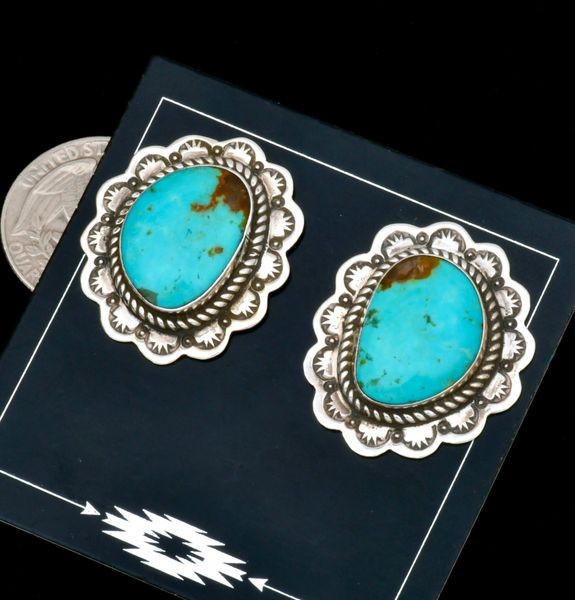 Gina James' Kingman turquoise Navajo earrings.