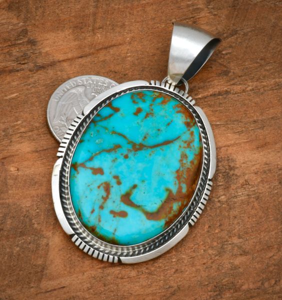 Large Kingman turquoise Navajo pendant by Alfred Martinez. #2569