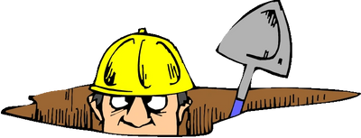 contractor with shovel in a hole