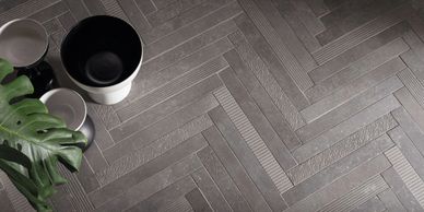 grey porcelain herringbone pattern flooring chevron pattern Italian porcelain tile porcelain slab