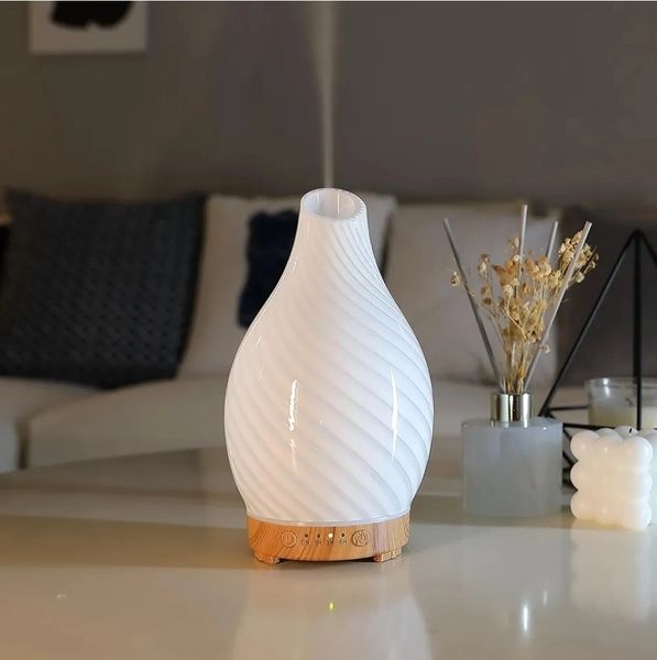 White Swirl Aromatherapy Diffuser + 4 Fragrance Oils