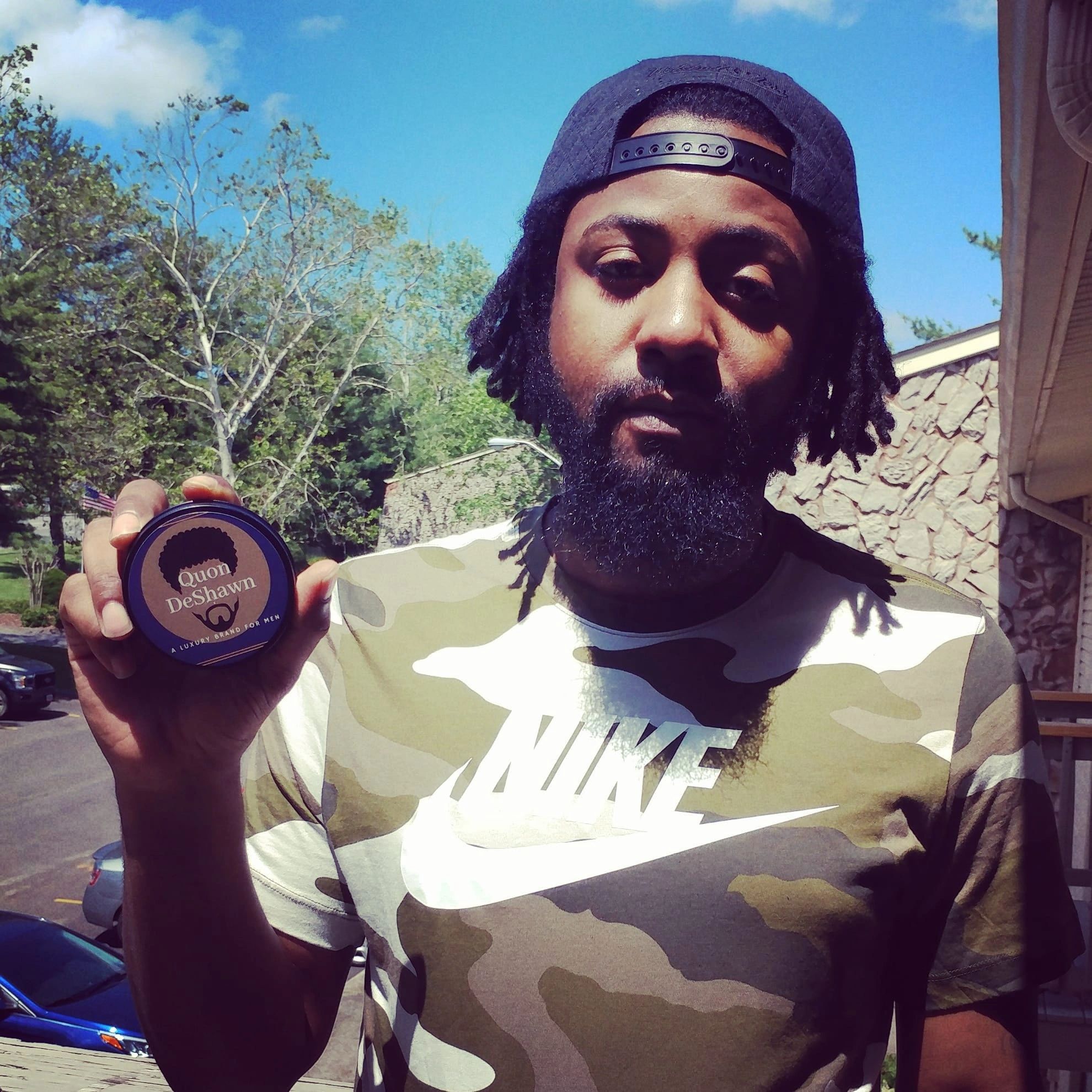 Quon DeShawn and his beard balm