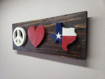 Peace Love Texas is made in Texas from reclaimed wood.