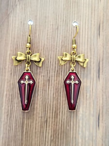 Red Enamel Coffins with Gold Bow Charms