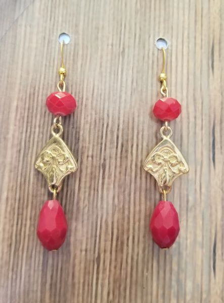 Red Glass Beads with Gold Shield Charm