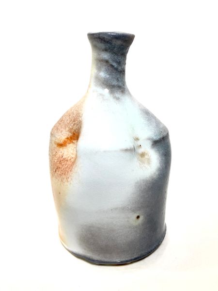 Dimples the Porcelain Bottle