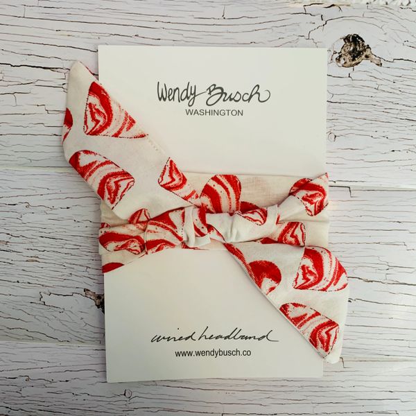 White with red swirl hearts