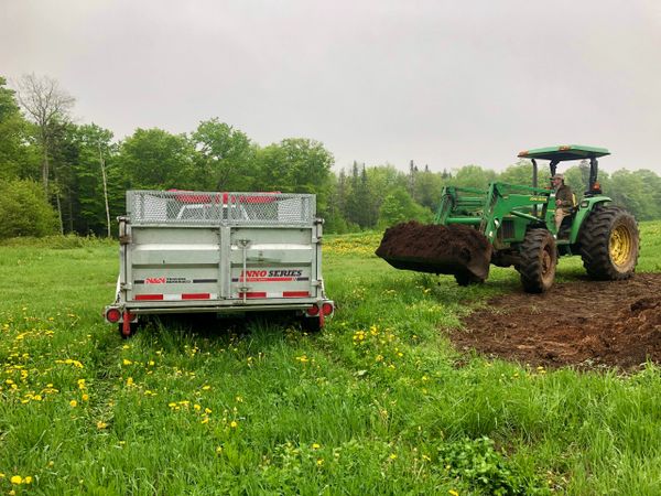 Organic compost pick up from local dairy farm.