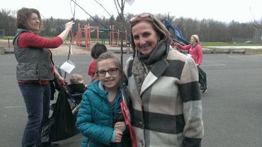4th grade student with Arbor Day tree sapling