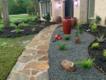 New landscaping design   And  flagstone walkway 