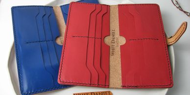 "The Charlotte" Ladies Wallet, has 12 card slots and 2 large slots for notes/bills. Folds in half.