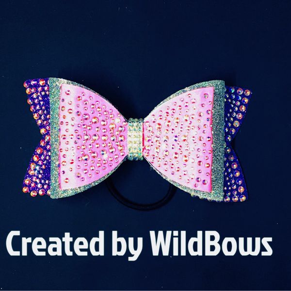 Center burst rhinestoned dolly bow in purple, silver, and pink. | Wild Bows