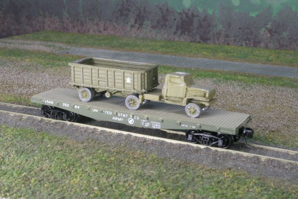 Chevrolet 1 1/2 Ton Tractor & 5 Ton Stake Trailer on US Army Transportation Corp Flat Car