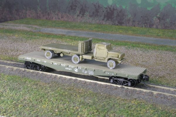 Chevrolet 1 1/2 Ton Tractor & 5 Ton Flatbed Trailer on US Army Transportation Corp Flat Car