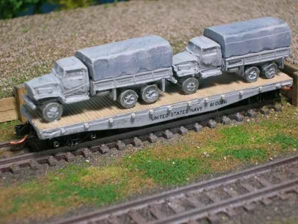 (2) Chevrolet 2 1/2 Ton Cargo Trucks on US Navy Flat Car