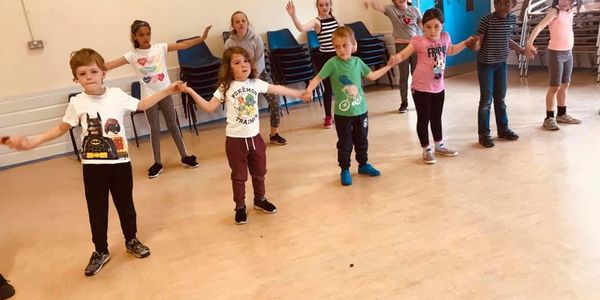 Children in mainstream education dancing.
