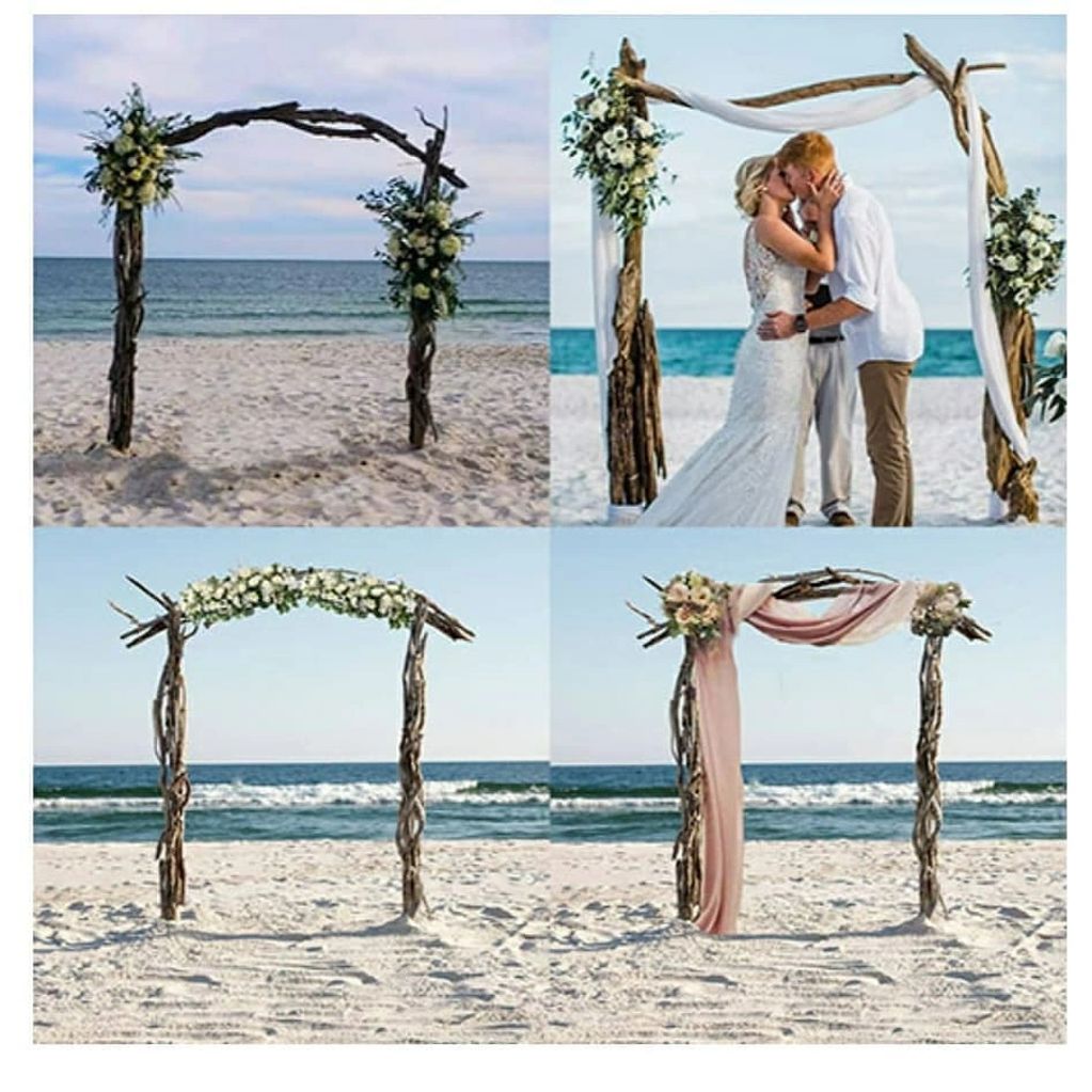 These amazing handcrafted driftwood beach wedding arches adorned with silk and fresh flower sprays. 