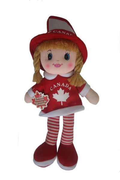 CANADA GIRL KICKIN' PLUSH DOLL WITH HOOK AND WORD "CANADA" & MAPLE LEAF .. SIZE : 12" X 7 1/2" INCHES .. NEW