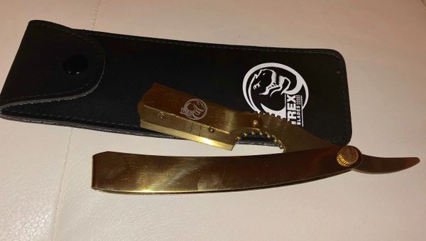 Gold T-Rex razor