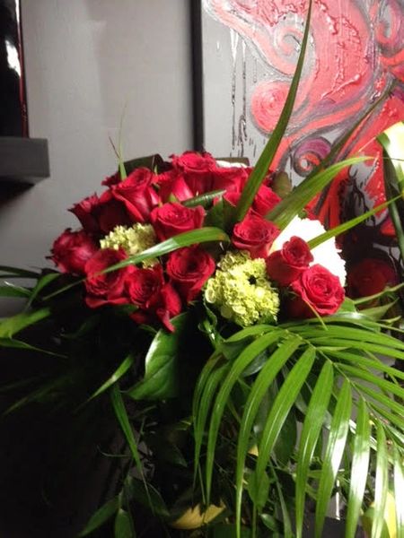 Long Stem Red Roses In A Tall Glass Vase With Accents