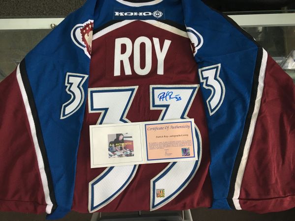 Patrick Roy Colorado Avalanche Autographed White CCM Heroes of Hockey Jersey  with 96 01 SC Champs Inscription