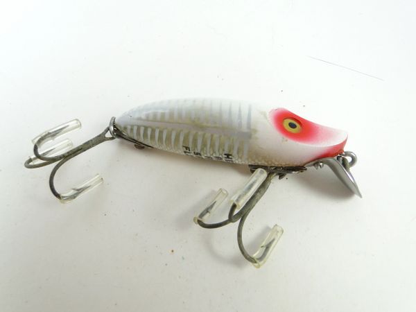 Twenty Four Heddon River Runt Spook Lures.