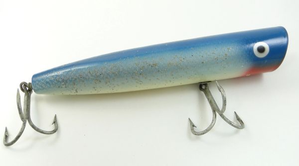 Vintage Lures - 'Surf Popper' by Creek Chub Bait Co.  Get the history  behind some of the most iconic fishing lures out there and discover some  unexpected facts about your tackle