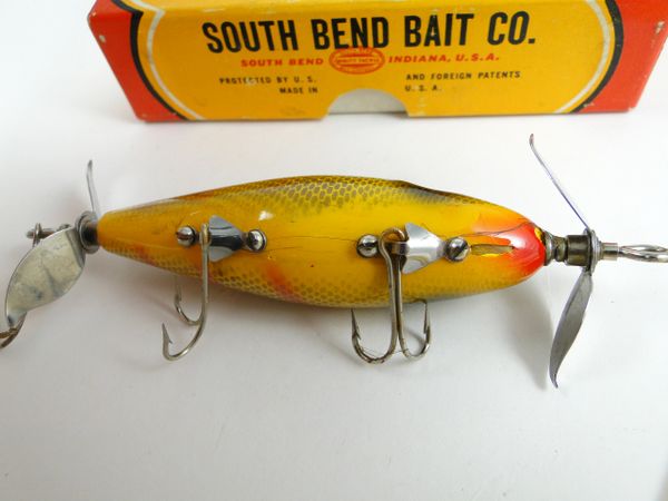Vintage 3 1/4 wooden fishing lure, similar to a South Bend Nip-I