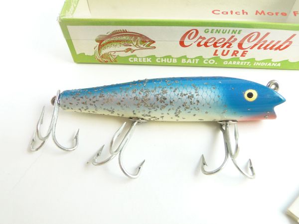 Vintage Lures - 'Surfster' by Creek Chub Bait Co.  Get the history behind  some of the most iconic fishing lures out there and discover some  unexpected facts about your tackle through