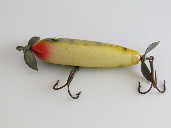 Sold at Auction: Fishing vtg Lure Paw Paw Minnow Caster Wood Glass