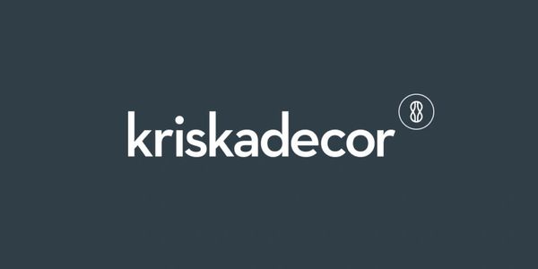 Kriskadecor logo on dark background.