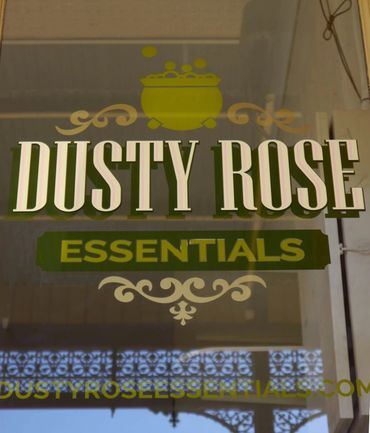Dusty Rose Essentials window lettering