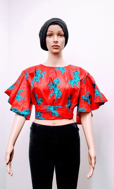 African Print Cropped Top Bell Sleeve Blouse.

100% Cotton. Machine wash cold.