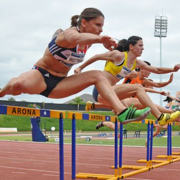 Athlete hurdling