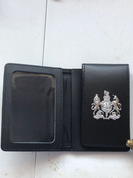 ID card wallet with attached coat of arms crest